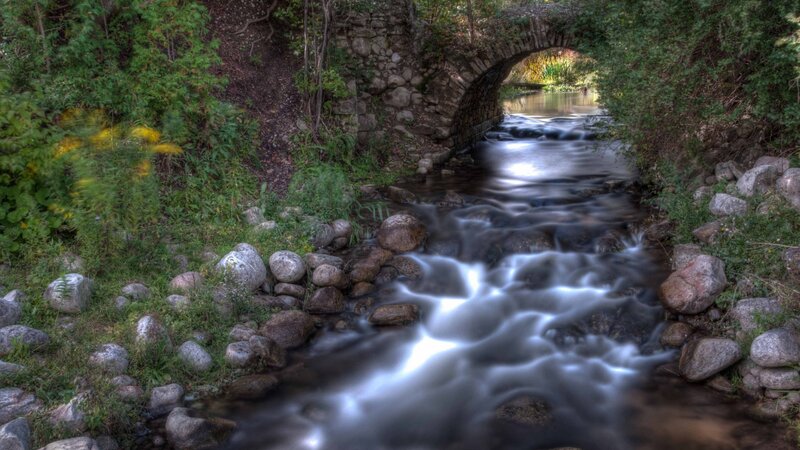 Stream under Stone Bridge — Green, Serene, Afternoon, Photograph