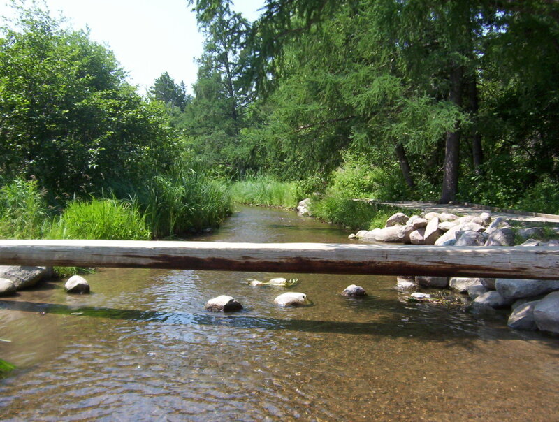 Stream with wooden railing