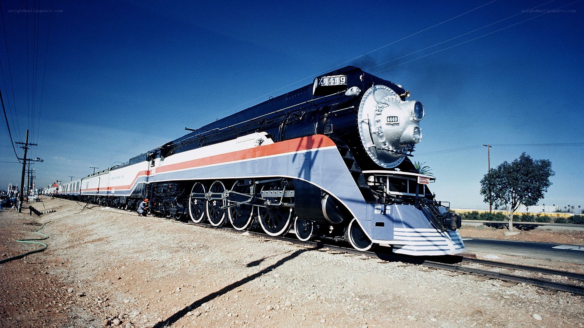 Streamlined steam locomotive on track