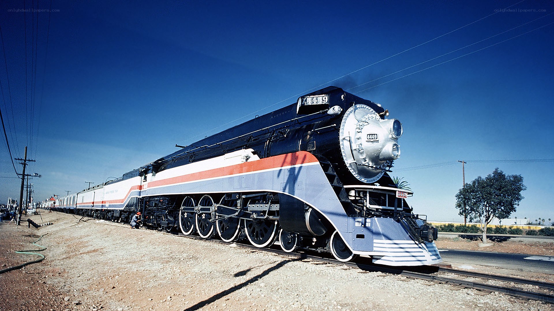 Streamlined steam locomotive on track