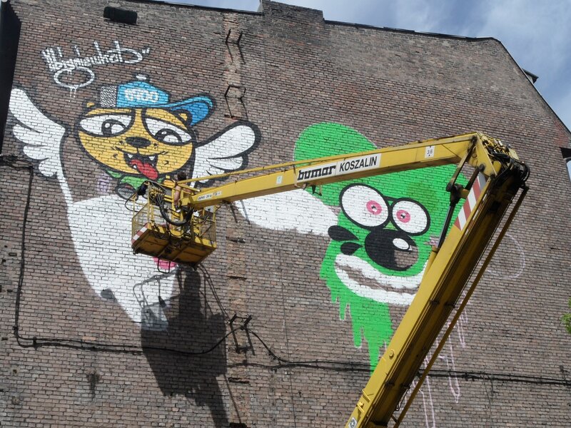 Street art mural on brick wall