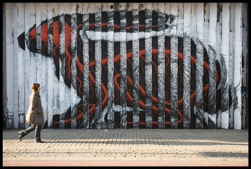 Street art of a bear on a wall