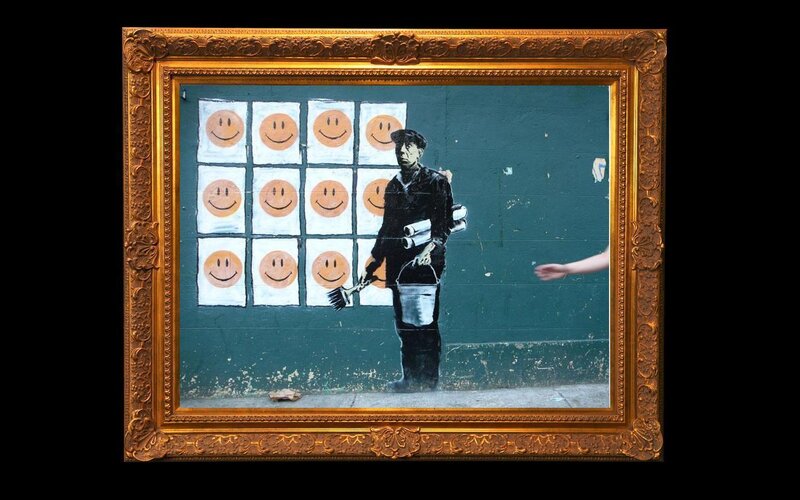 Street Artist Painting Smiley Faces