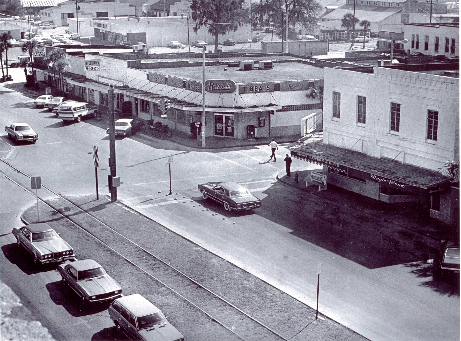 Street corner with Rexall and Magic Wand