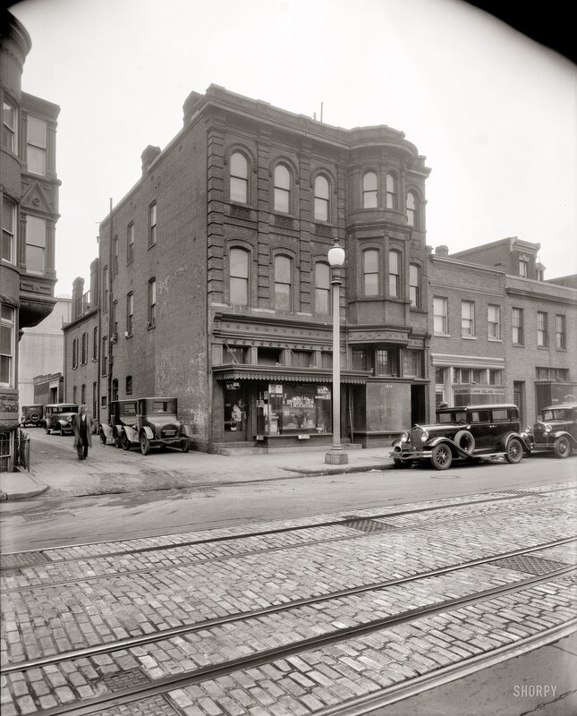 Street corner with vintage cars
