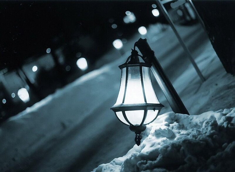 Street lamp in snowy night