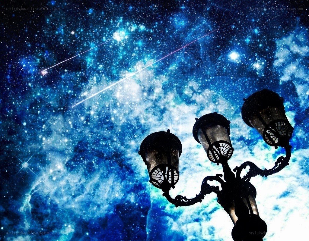Street lamp under starry sky
