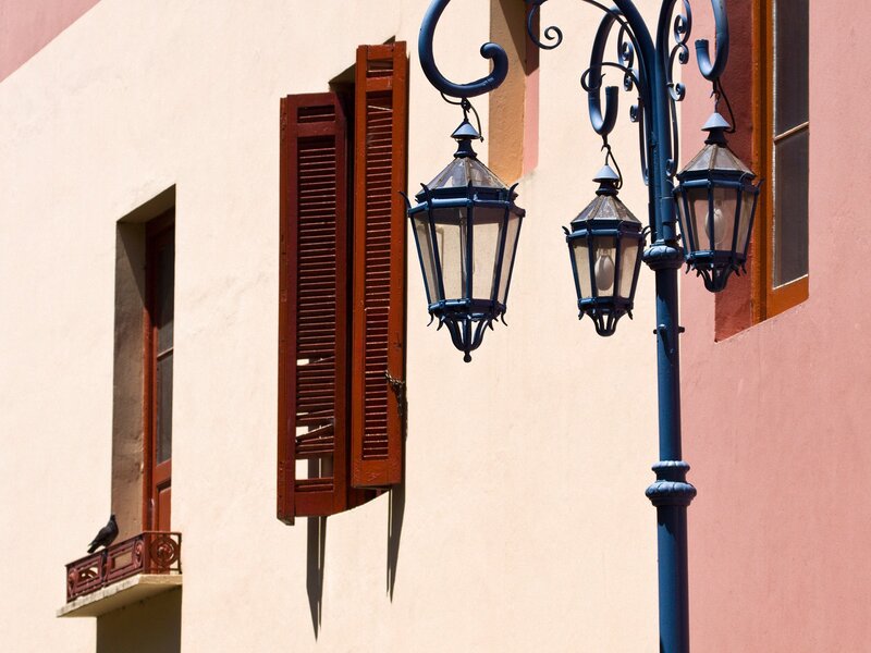 Street lamp with lanterns and shutters