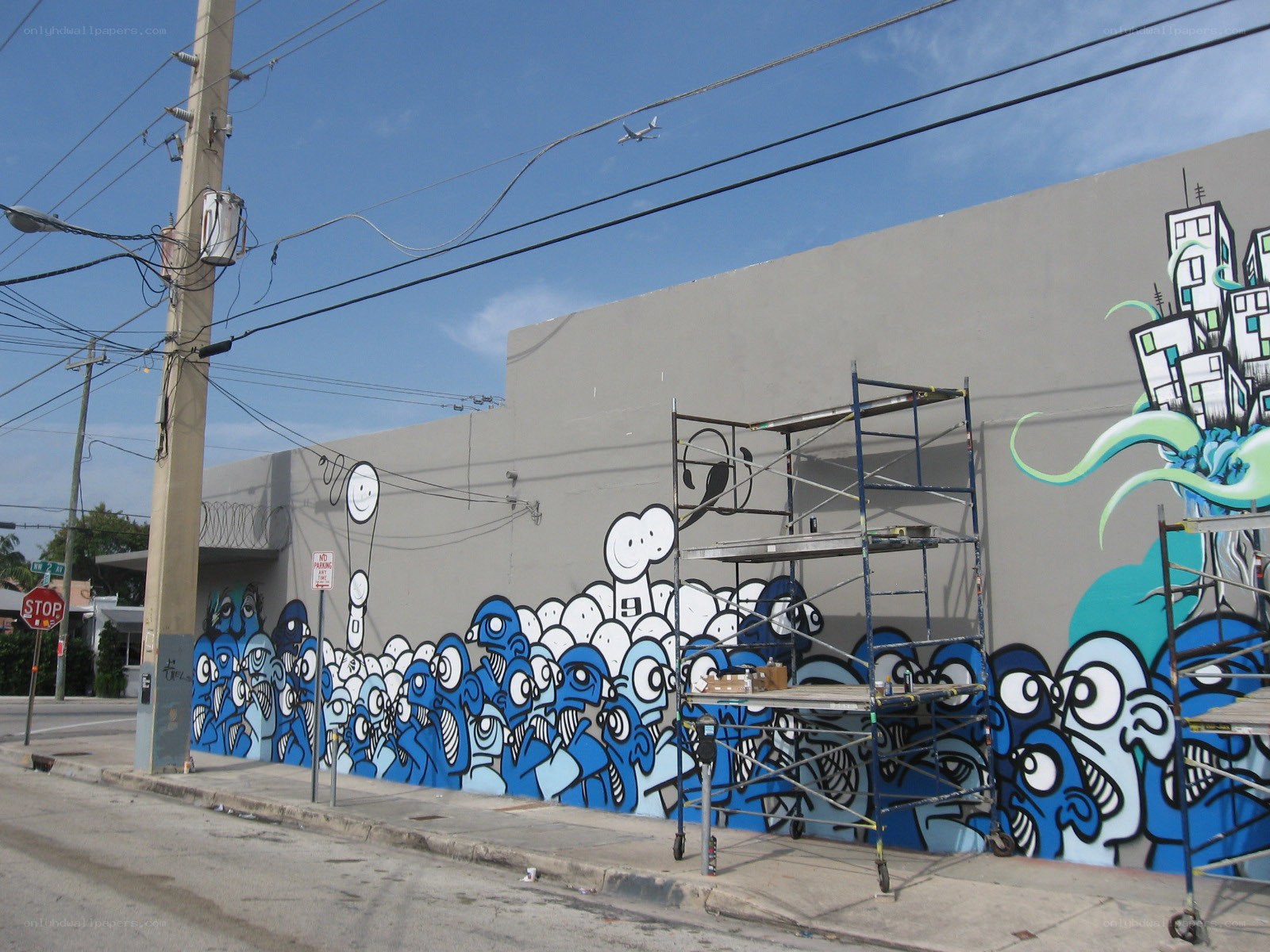 Street mural with blue figures