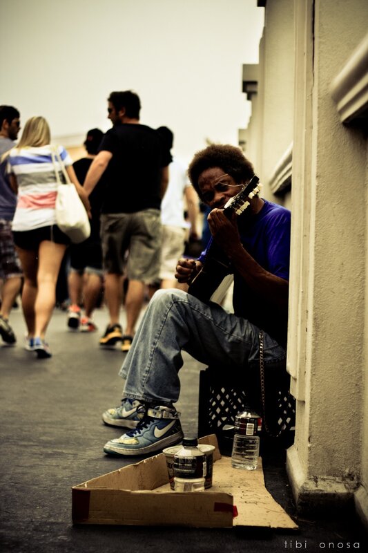 Street musician playing guitar