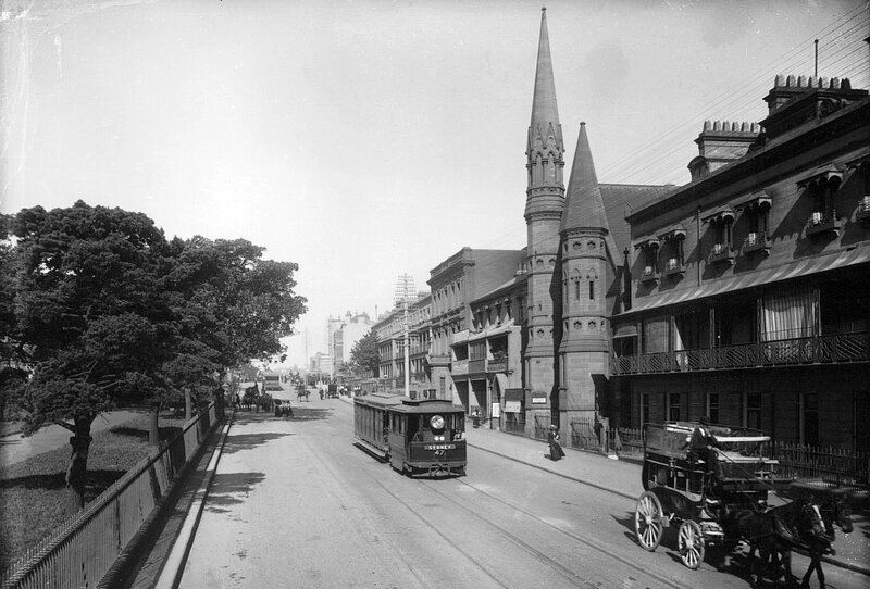Street scene with tram and church