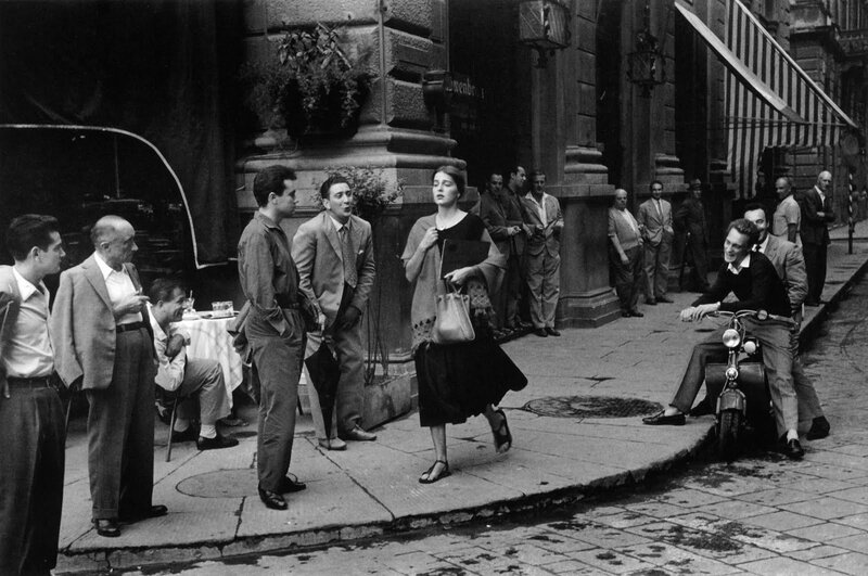 Street scene with woman walking