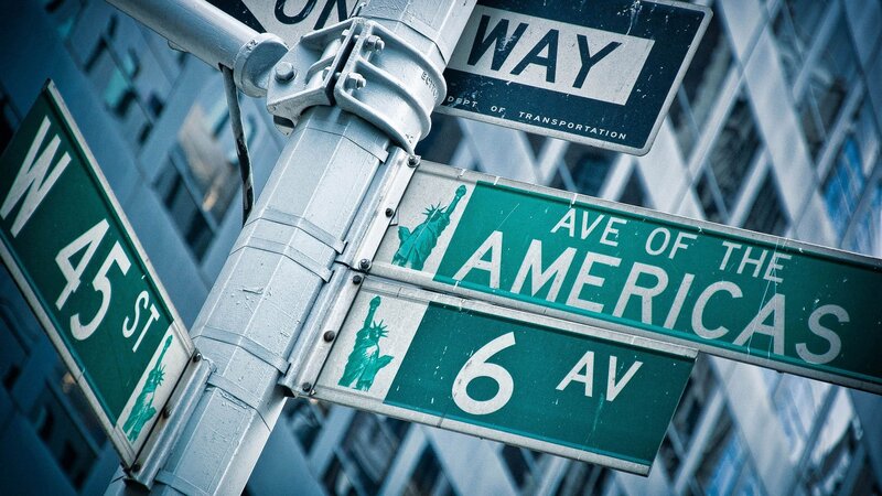 Street signs at 45th and 6th Avenue