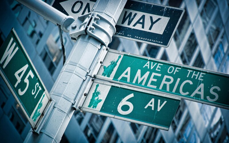 Street signs at 6th Avenue and W 45th Street