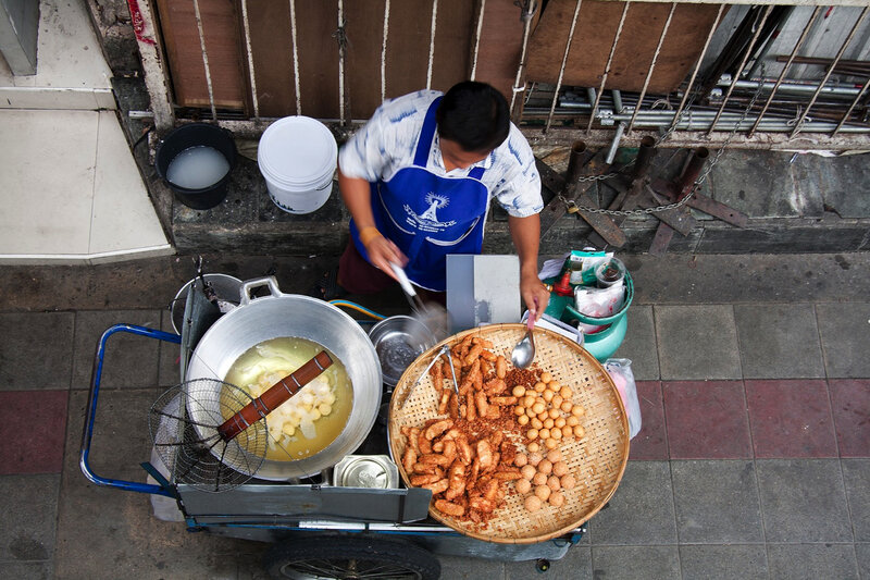 Street vendor frying food