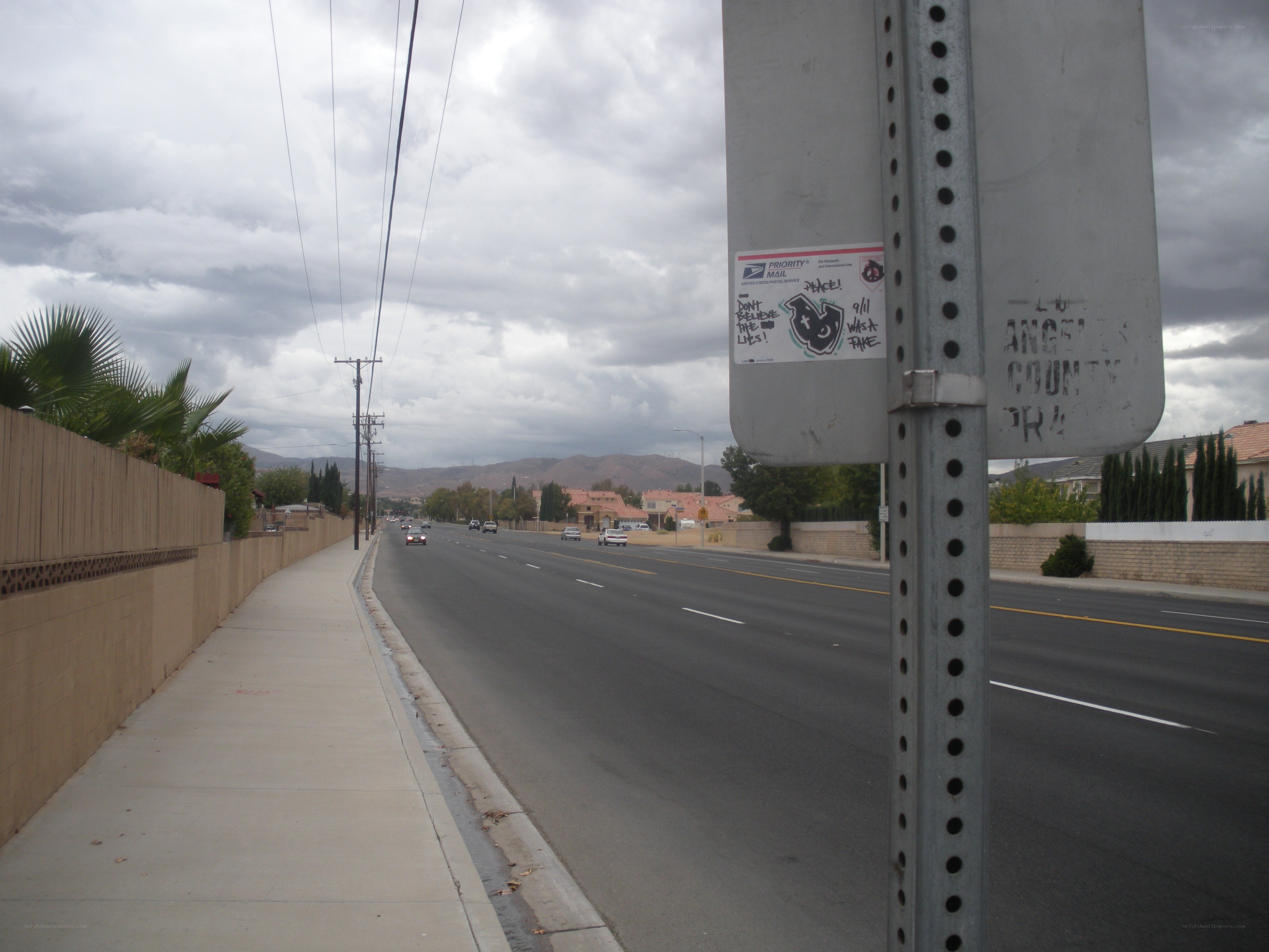 street with graffiti and mountains