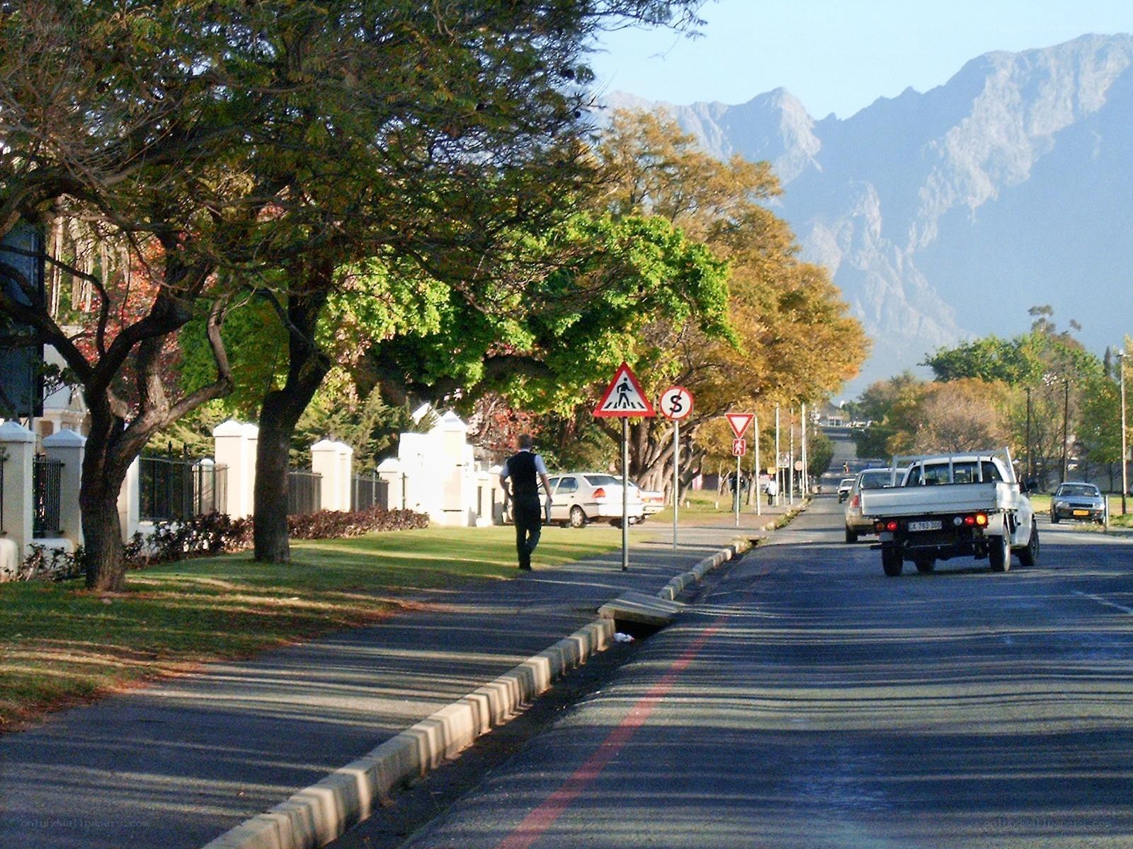 Street with mountains in background