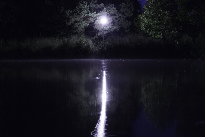 Streetlight Reflection on Water