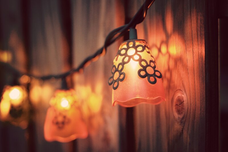 string lights on wooden wall