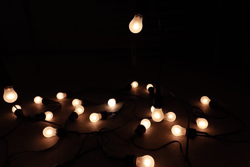 String of Light Bulbs — Black, Dark, Night