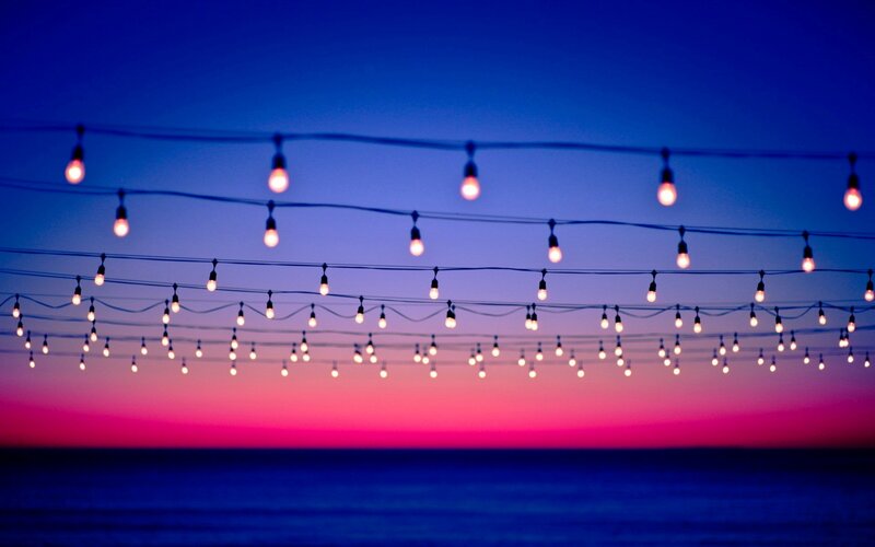 String of Lights over Ocean — Blue, Serene