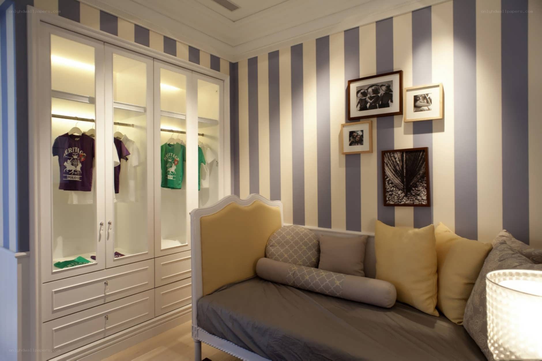 Striped bedroom with built-in closet