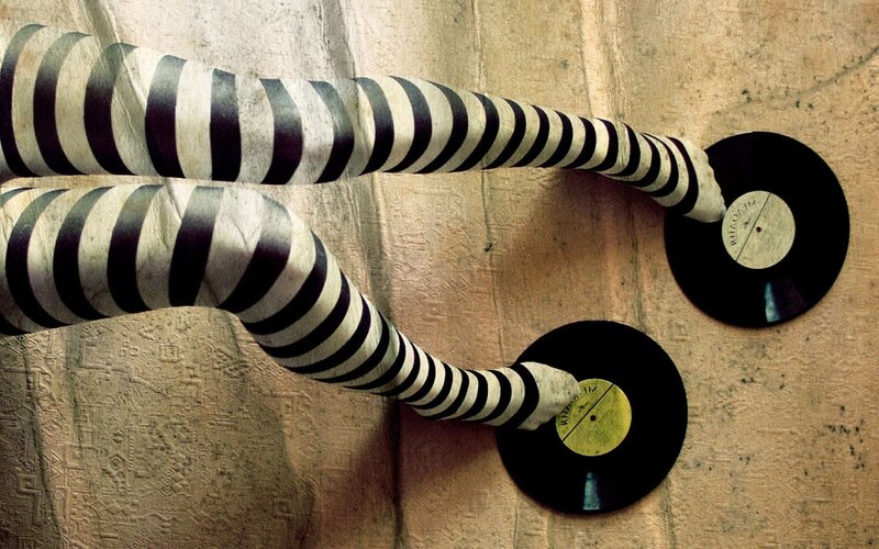 striped legs on vinyl records