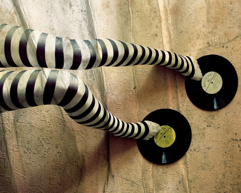 striped legs on vinyl records