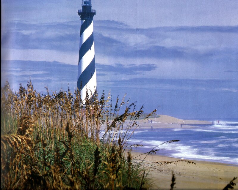Striped Lighthouse on Beach