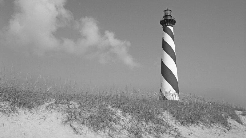Striped Lighthouse on Dune