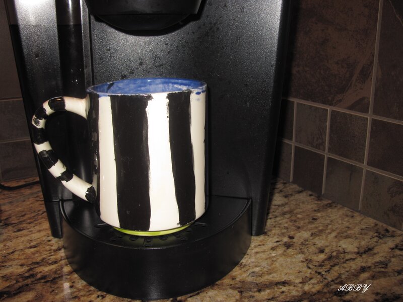 Striped Mug on Coffee Maker