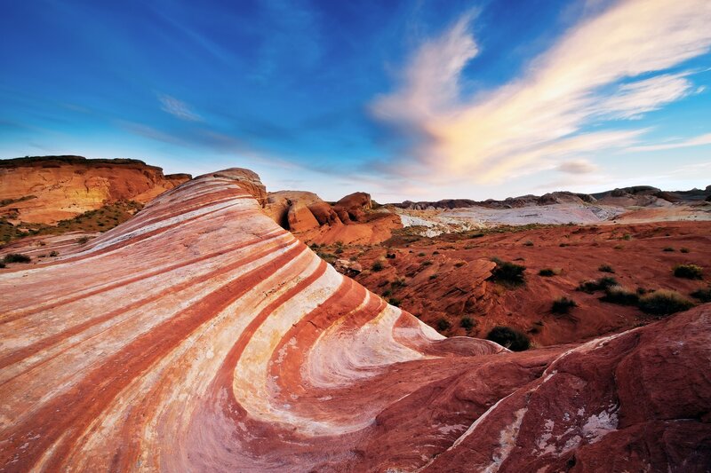 Striped rock formations in desert