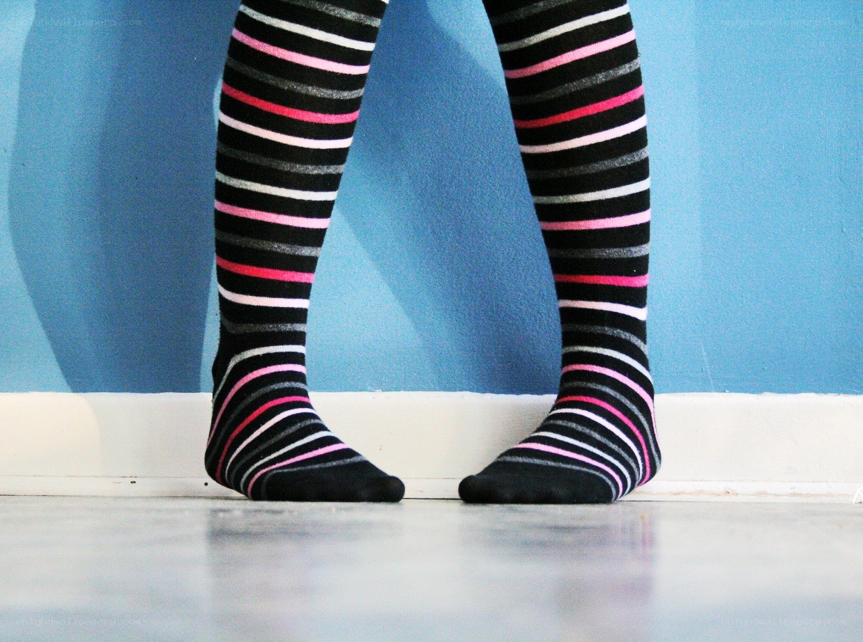 striped socks on legs
