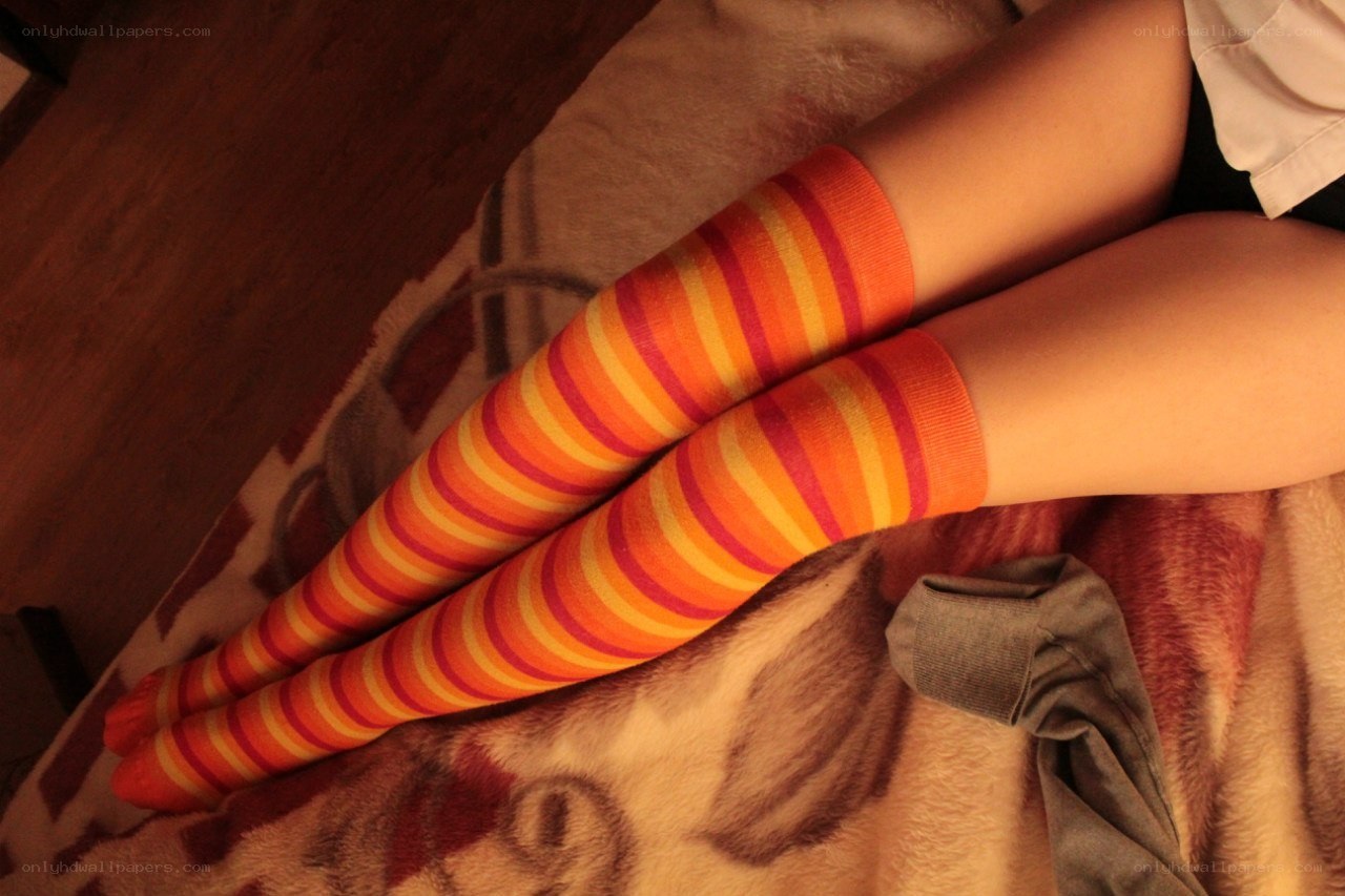 striped socks on legs