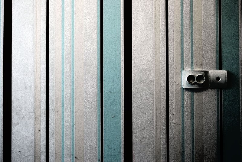 striped wall with electrical outlet