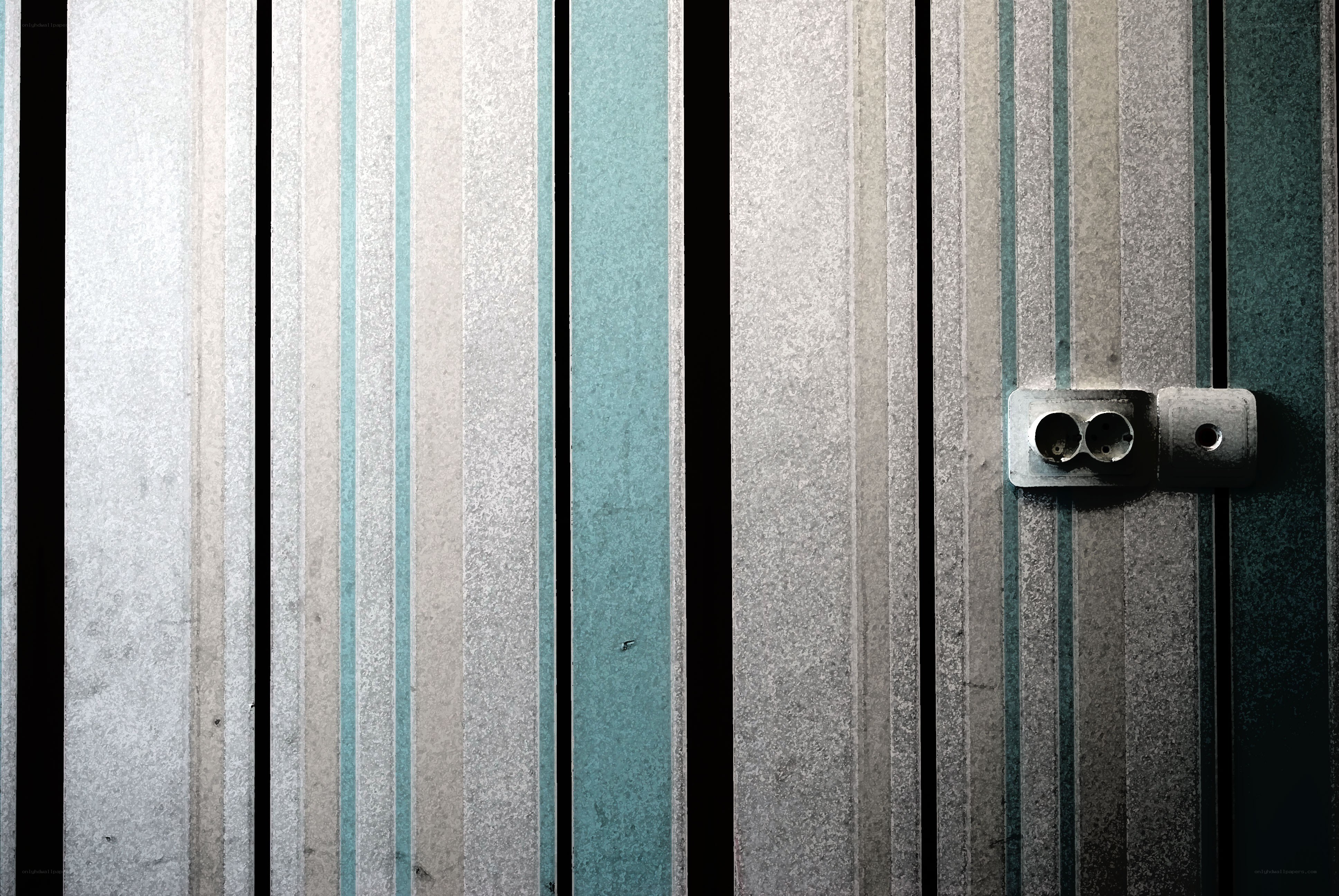 striped wall with electrical outlet