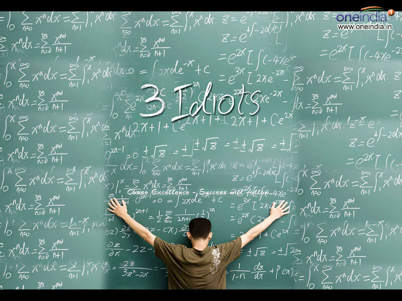 Student at chalkboard with math
