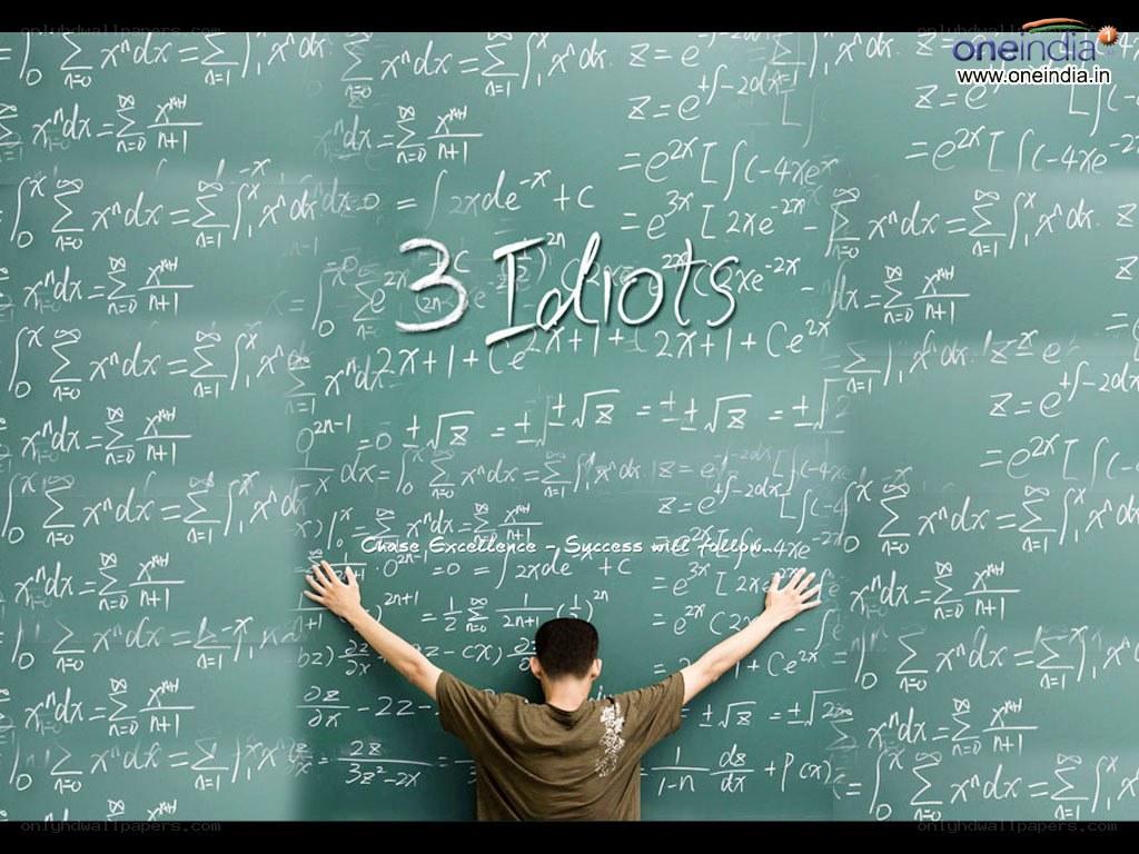 Student at chalkboard with math