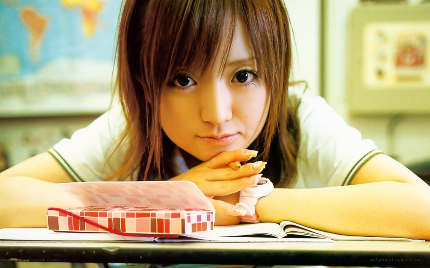 student at desk in classroom