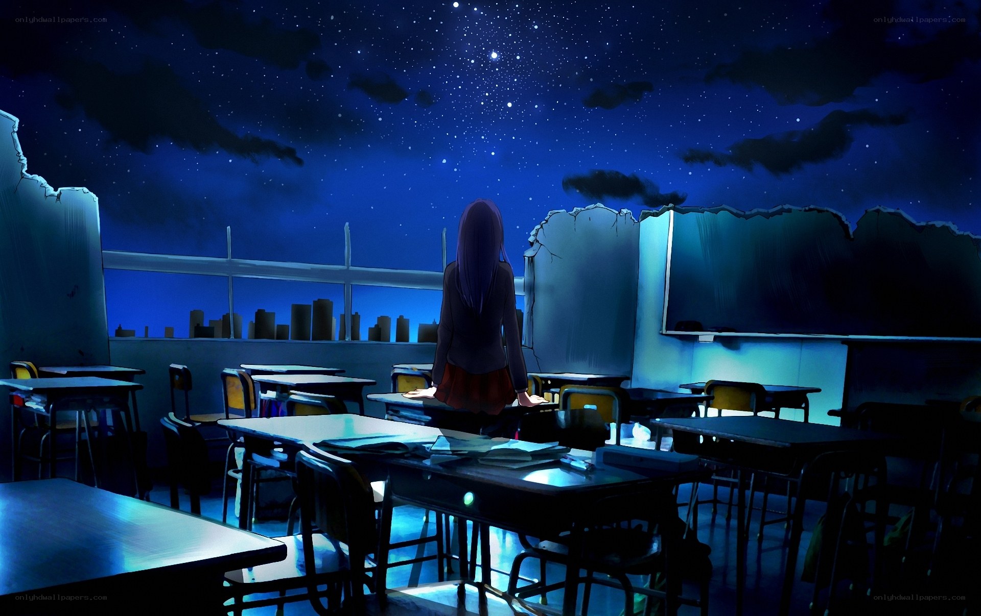 Student at night in a classroom