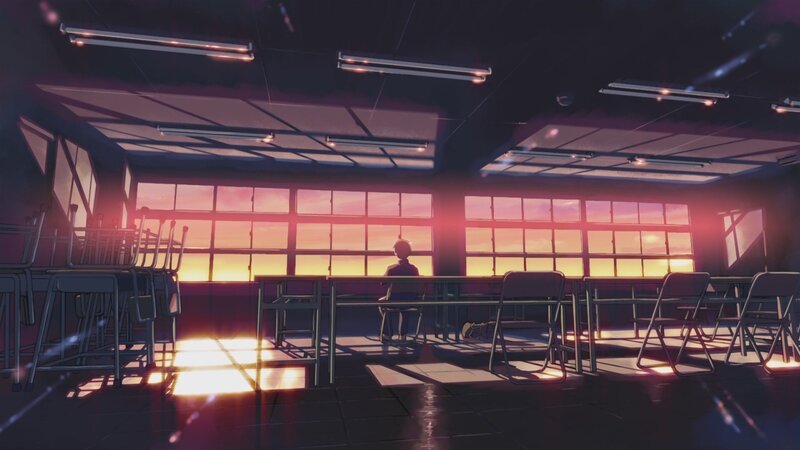 Student at sunset in empty classroom