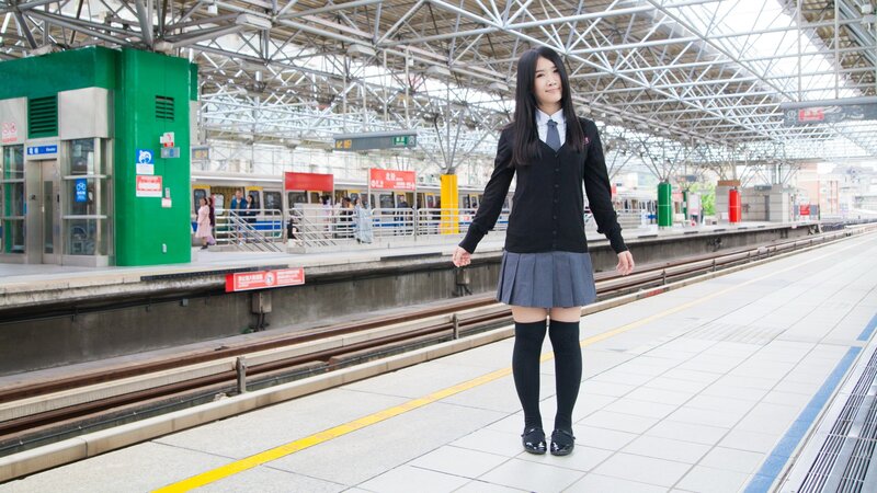Student at train station