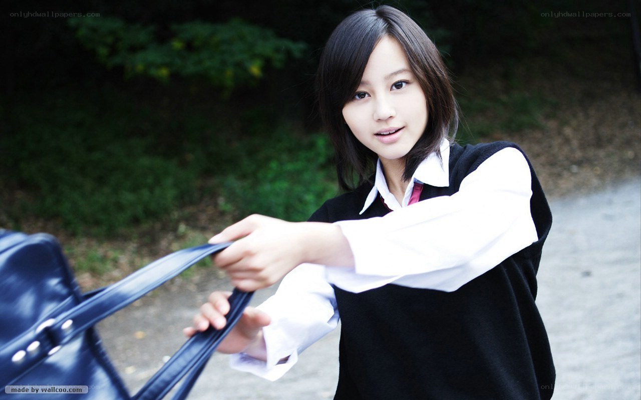student holding a bag