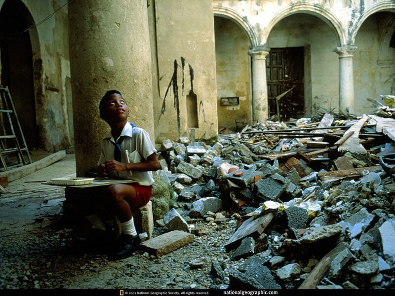 Student in a ruined courtyard