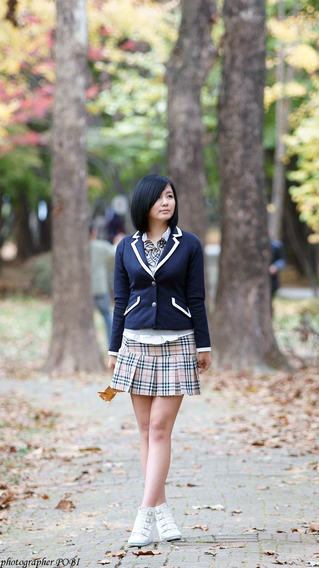 student in autumn park