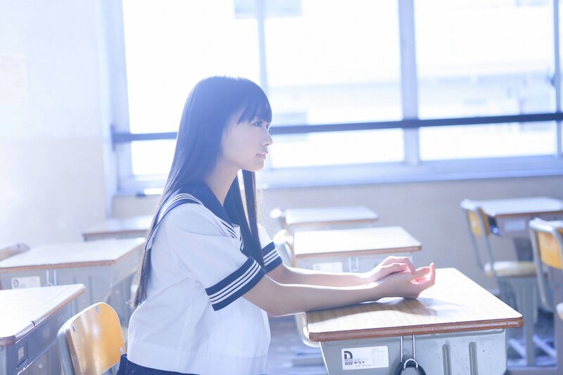 Student in classroom at window