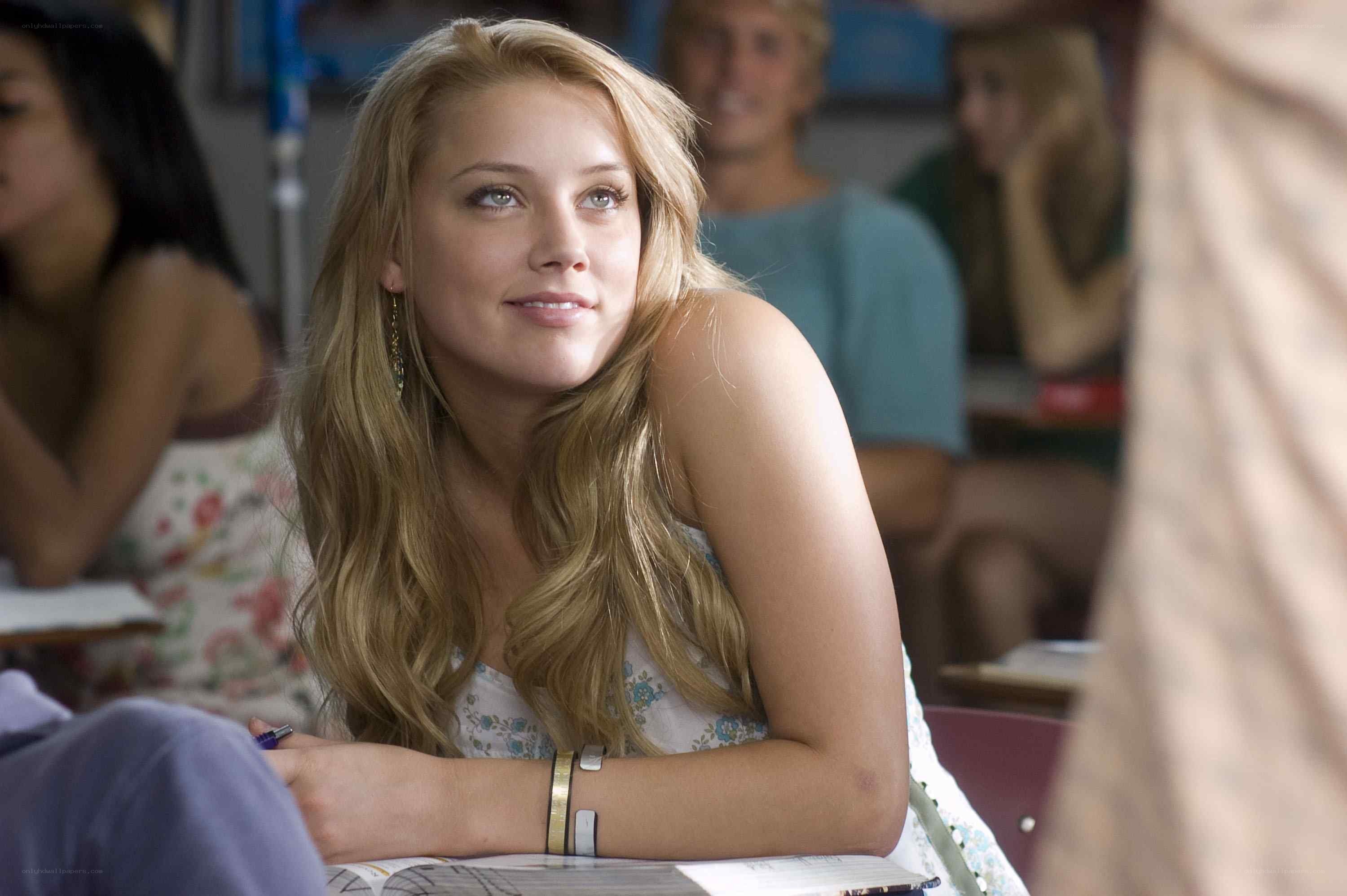 Student in classroom looking up