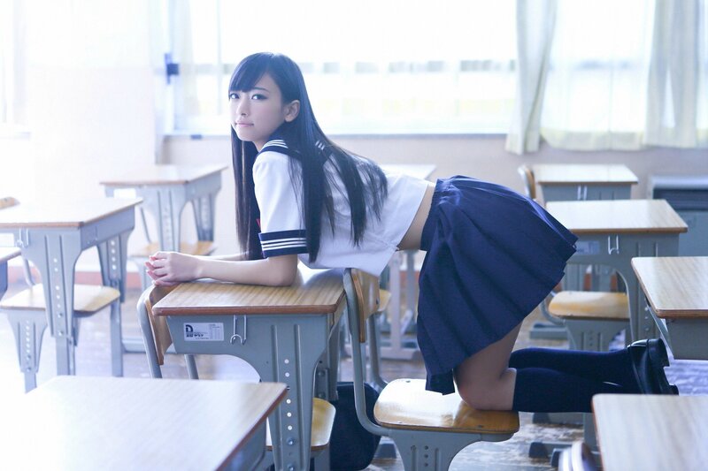 student in classroom uniform