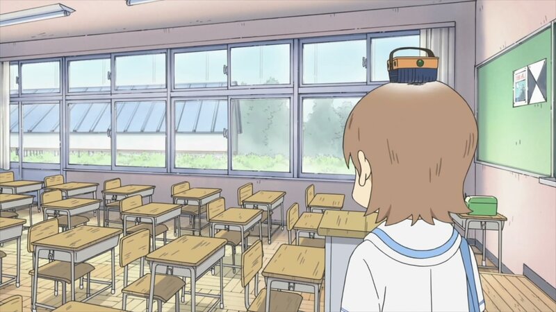 student in empty classroom