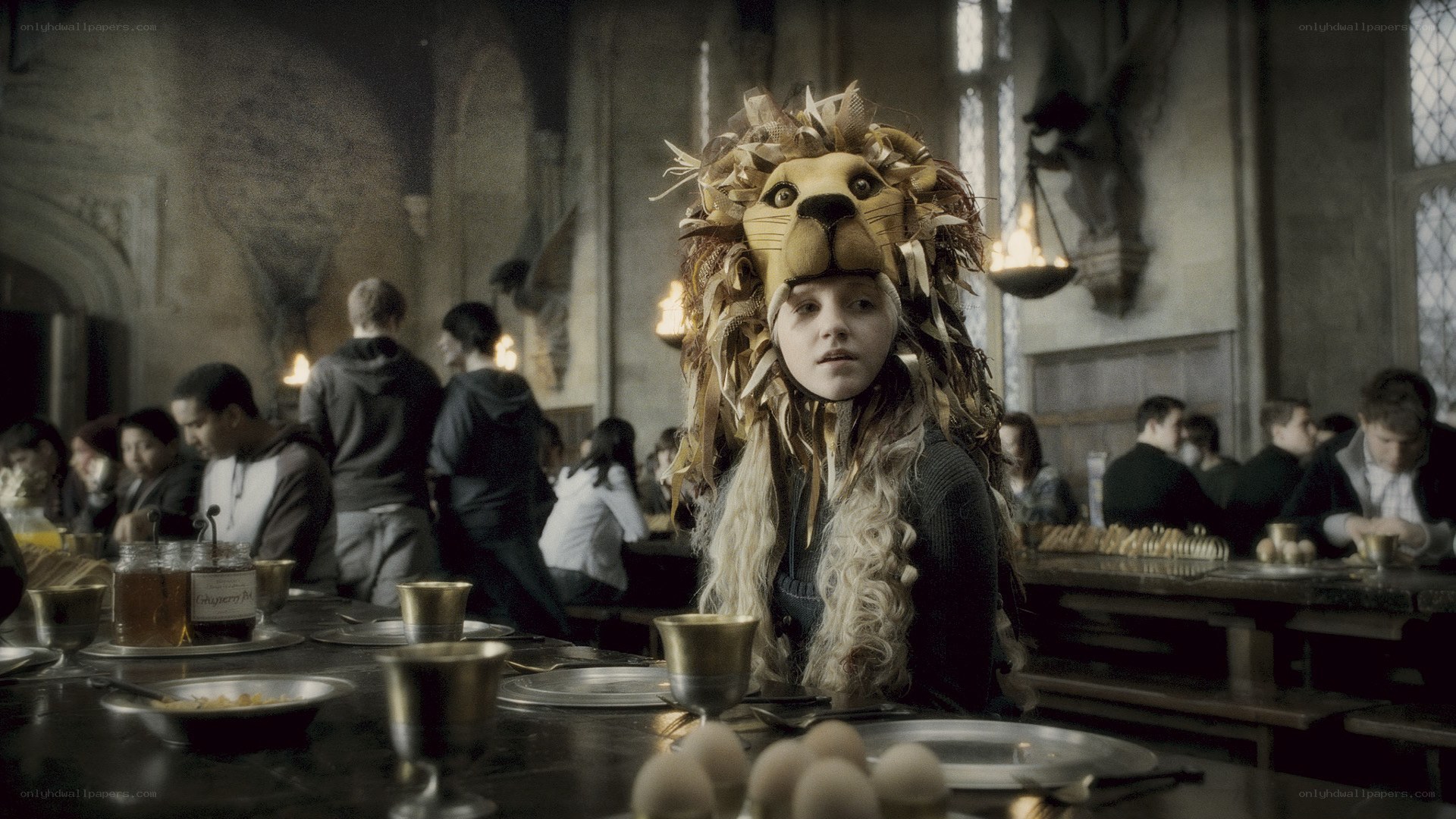 student in lion hat at dining hall